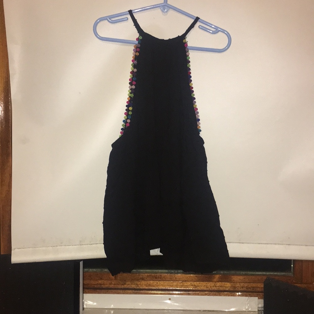 black halter top with pom-pom lining